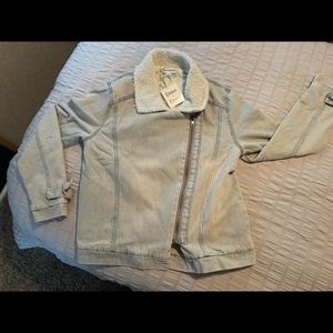 Brand new with tags. Size med, runs big.